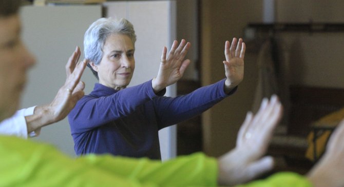 Jill Kleinberg, 64, Lawrence, attends a Tai Chi class Wednesday sponsored by the Lawrence Parks and Recreation Department at the Lawrence Senior Center. A study by researchers at Kansas University’s School of Social Welfare has concluded that Lawrence has much to gain economically from attracting retirees.