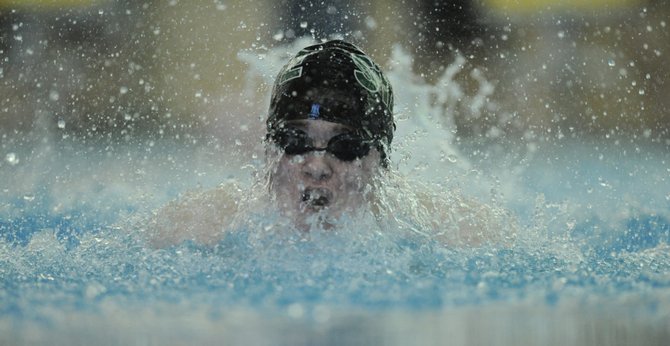 Free State’s Nolan Frank takes a breath during the Free State Invitational on Thursday