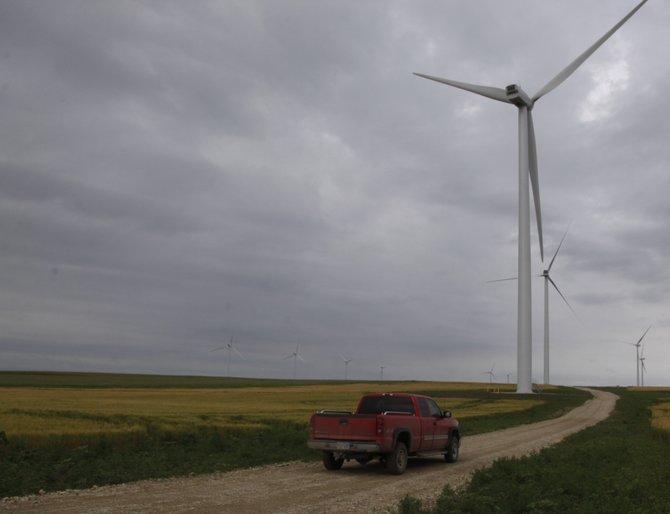 Meridian Way Wind Farm's 67 turbines are spread out over some 20,000 acres of farmland. Among the benefactors are 65 landowners who lease the land to wind farm owner Horizon Wind Energy.